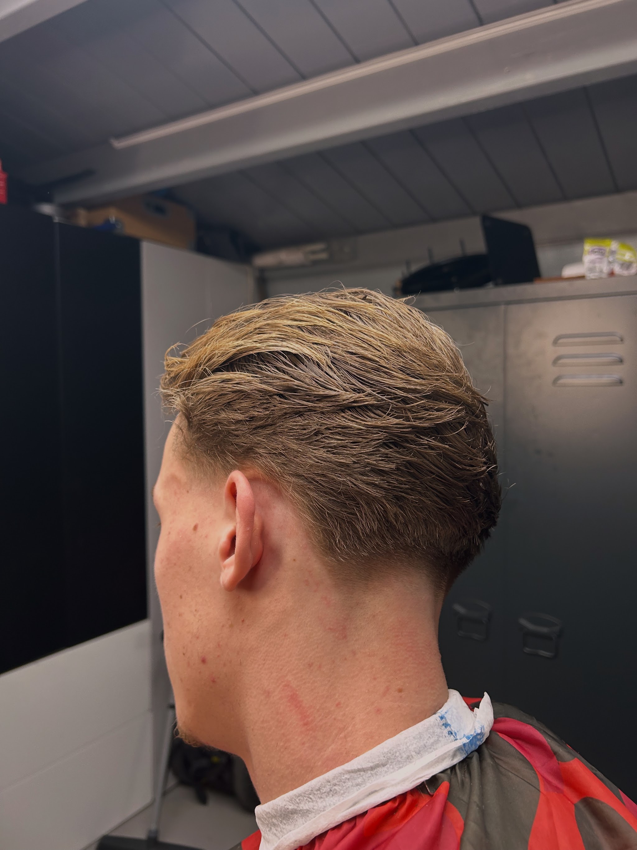 Een afgewerkte coupe met een strakke taper aan de achterkant